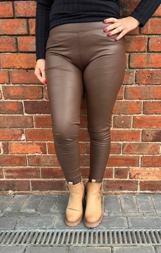 Buy Spilt Hem Detail Leather Look Leggings Burgundy For Women | Styli Saudi